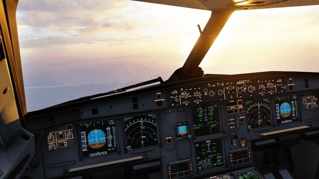 Airliner cockpit instrument panel viewed during a descent